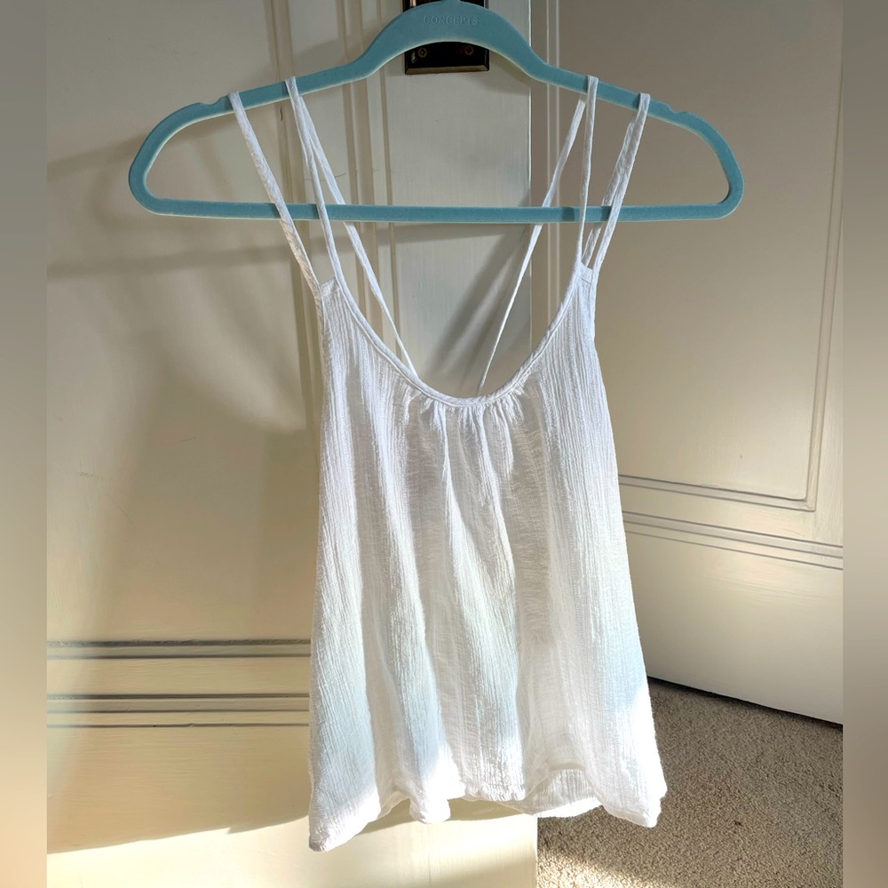 Loose white tank top - crossover straps in the back - perfect for the beach